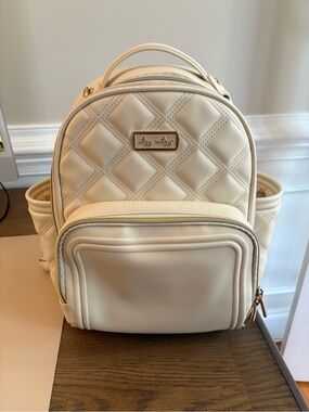 Itzy Ritzy Cream Quilted Backpack